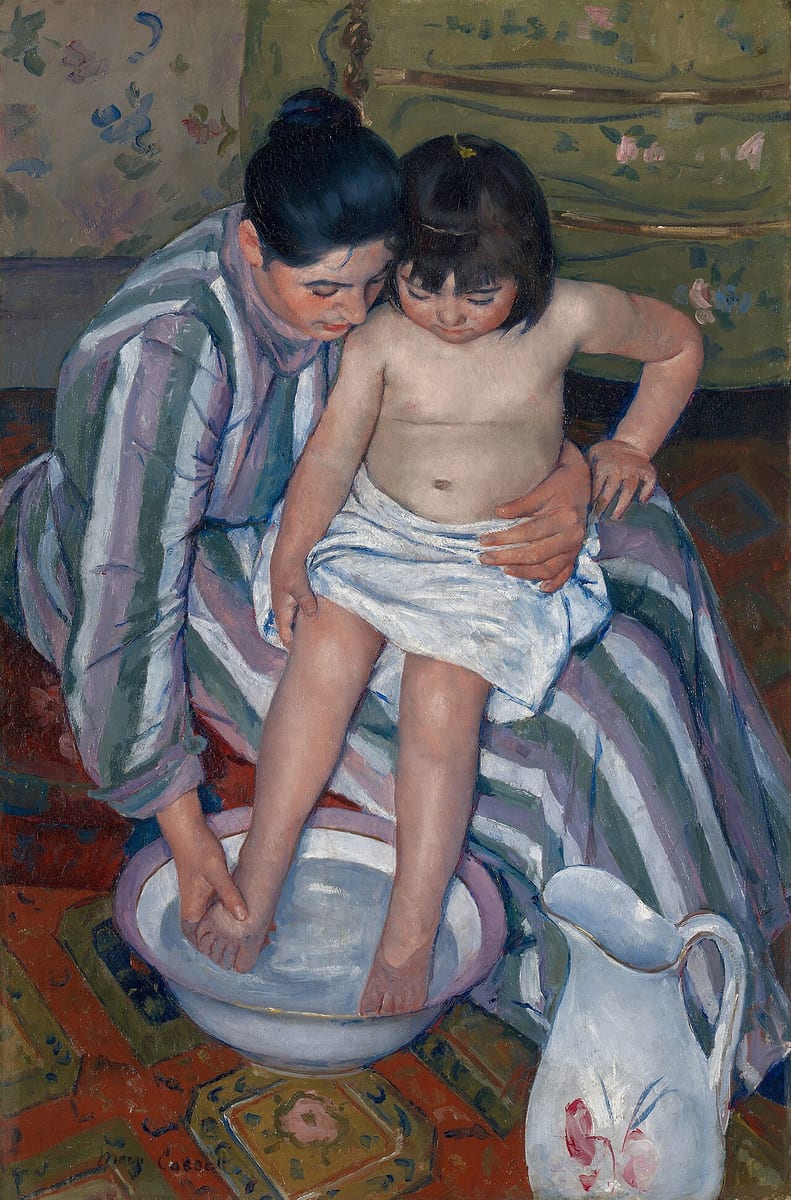 Painting of a woman in a striped dress holding a small child on her lap and washing the child's feet in a white basin, a flowered jug beside them